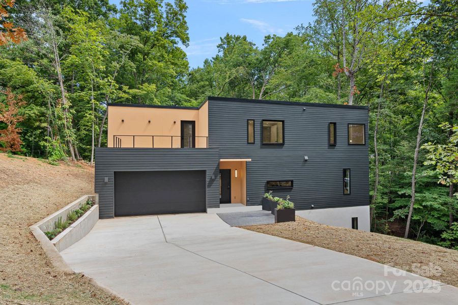 Front exterior of a new home in , Charlotte, NC, highlighting curb appeal (Image 25).