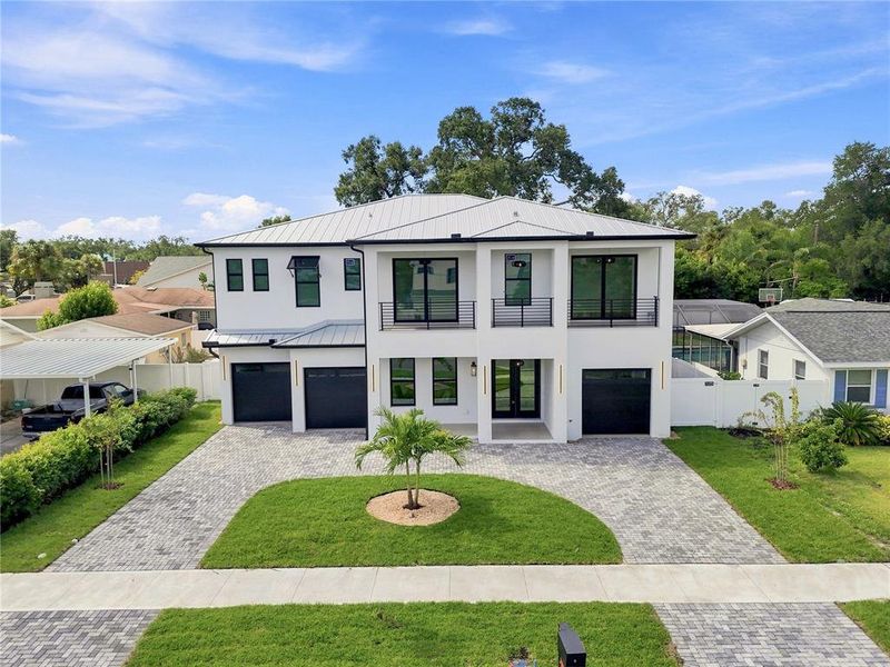 Front exterior of a new home in , Tampa, FL, highlighting curb appeal (Image 31).
