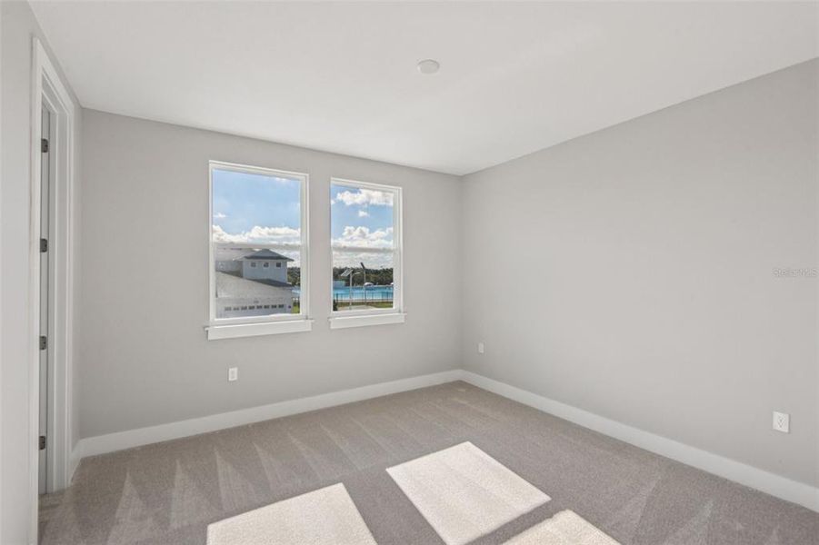 Spacious, unfurnished interior of a new home in Lagoon Residences at Epperson, Wesley Chapel (Image 24).