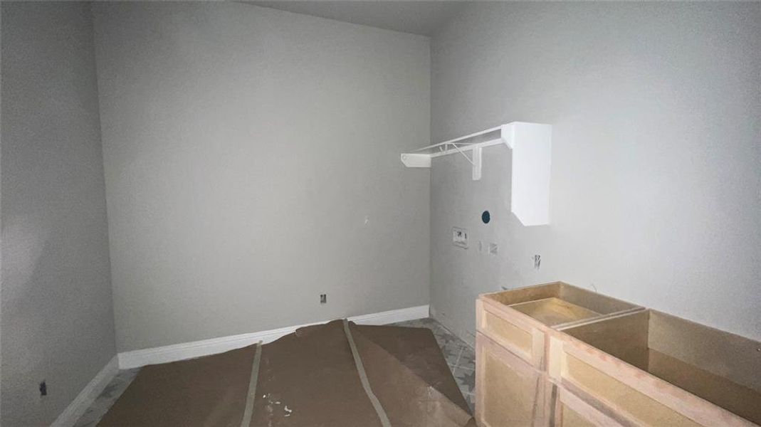 Laundry Room with Cabinet and Sink