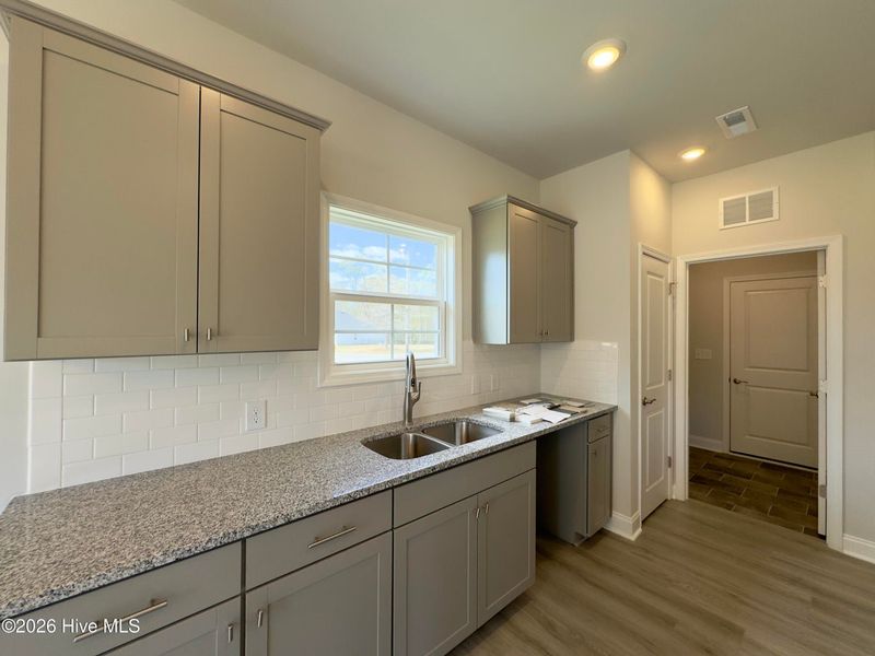 Furnished interior view inside a new home in East Lake, Leland (Image 7).