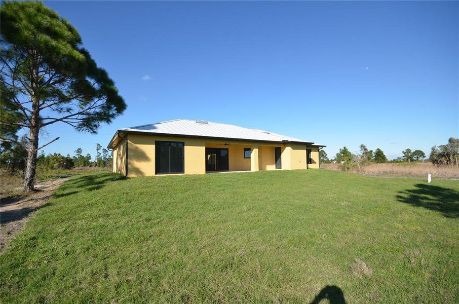 Exterior details and patio area of a home in , Lehigh Acres (Image 25).