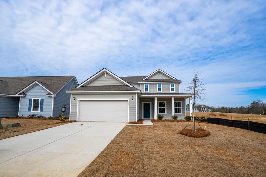Front exterior of a new home in Monroe Preserve, Chapin, SC, highlighting curb appeal (Image 24).