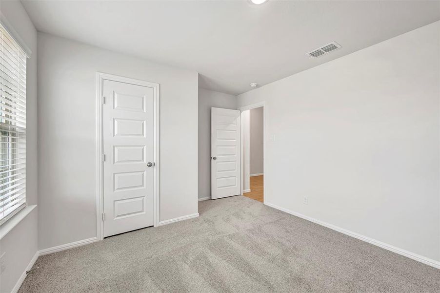 Spacious, unfurnished interior of a new home in Verandah, Royse City (Image 31).