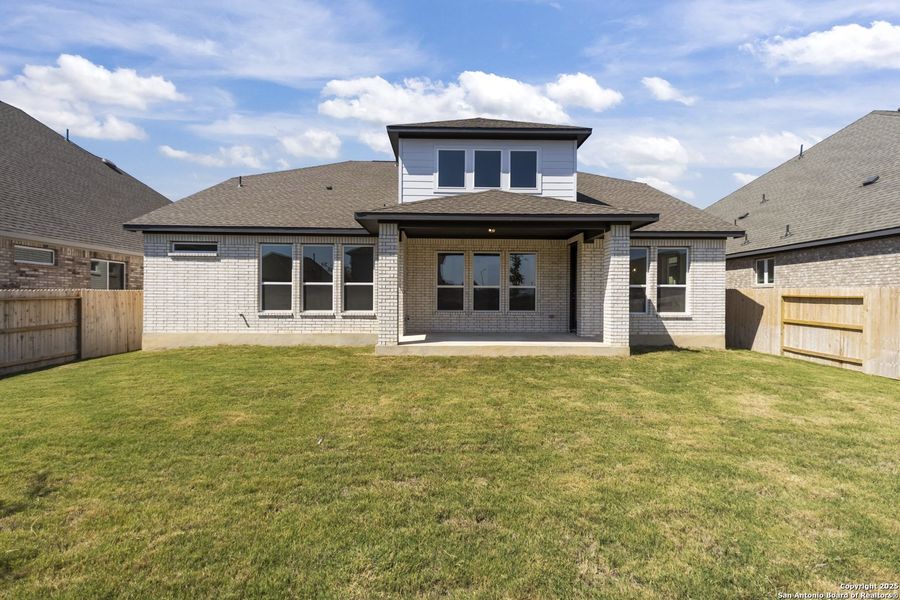 Exterior details and patio area of a home in Stillwater Ranch 60', San Antonio (Image 18).