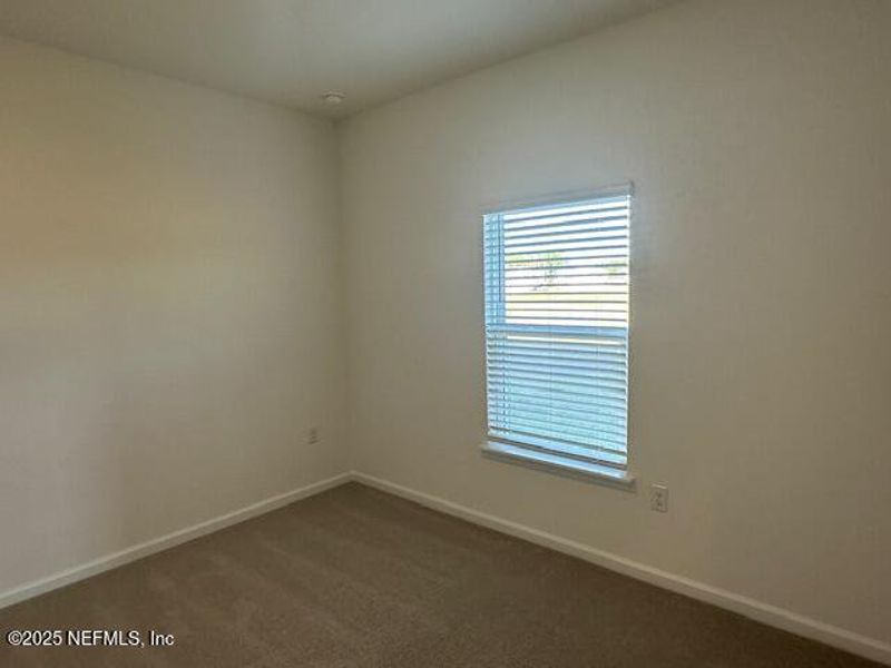 Spacious, unfurnished interior of a new home in Brook Forest - Villas, St. Augustine (Image 21).