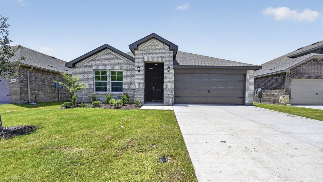 Front exterior of a new home in Sanger Circle, Sanger, TX, highlighting curb appeal (Image 1). Front exterior of a new home in Sanger Circle, Sanger, TX, highlighting curb appeal (Image 1).