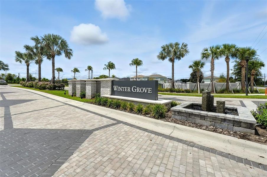 Front exterior of a new home in Winter Grove, Winter Garden, FL, highlighting curb appeal (Image 17).