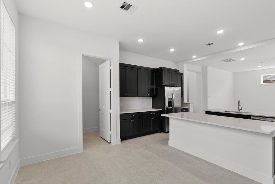 Furnished interior view inside a new home in The Trails, New Caney (Image 12).