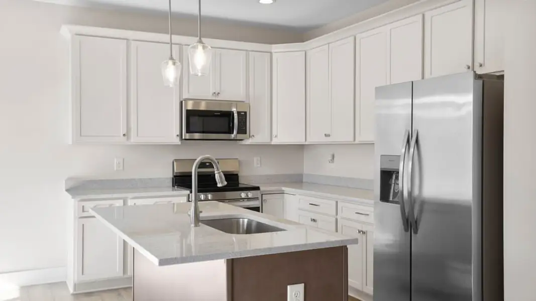 Representative furnished interior of a home built from the Atwood by D.R. Horton in Edgewood Estates, Greenville (Image 7).