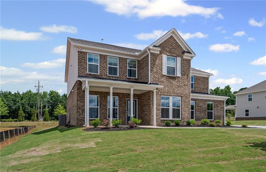 Front exterior of a new home in Anderson Point Estates, McDonough, GA, highlighting curb appeal (Image 19).