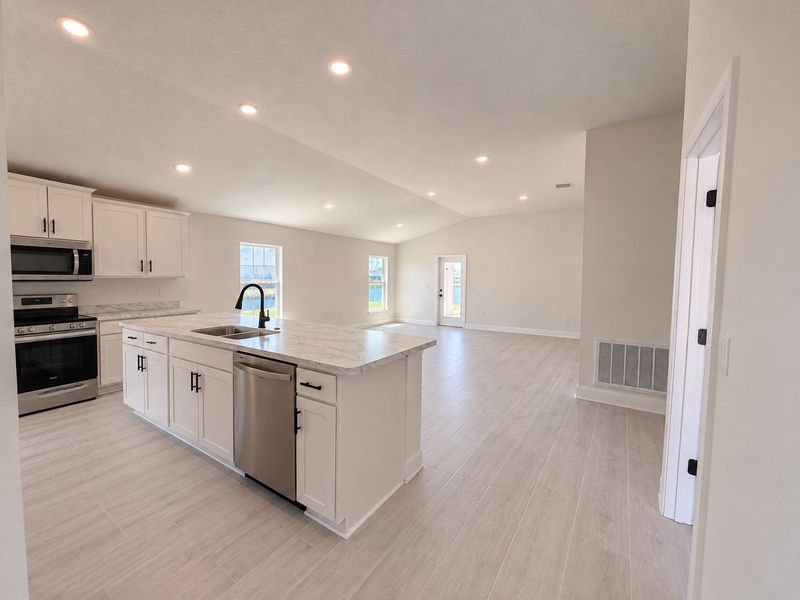 Furnished interior view inside a new home in St. John's Preserve, Palm Bay (Image 9).