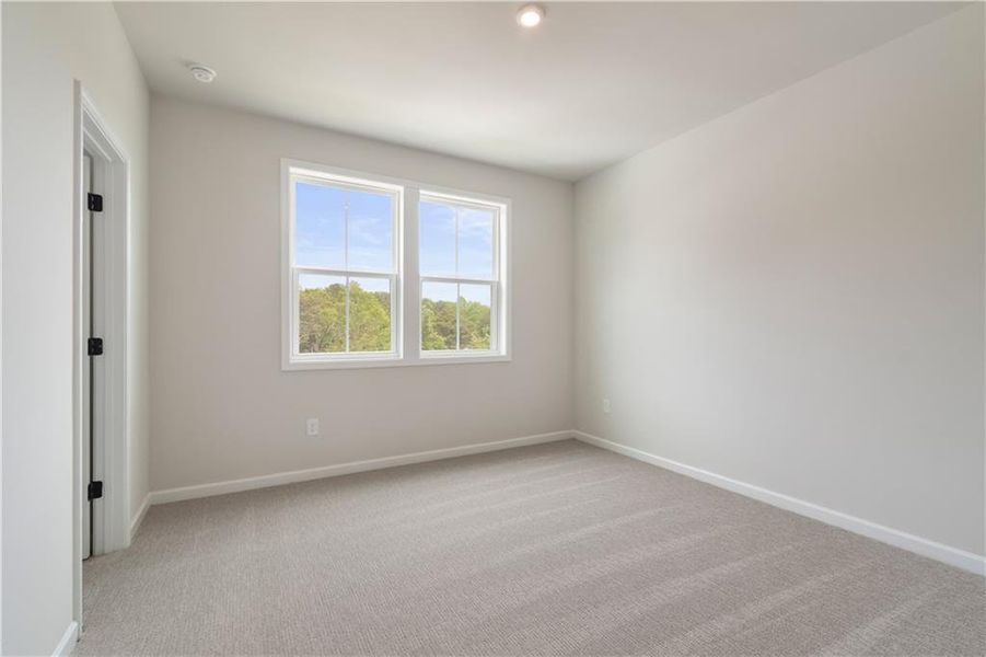 Spacious, unfurnished interior of a new home in Tiberon Woods, Cumming (Image 31).
