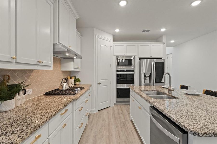 Furnished interior view inside a new home in Mustang Lakes 74', Celina (Image 3).