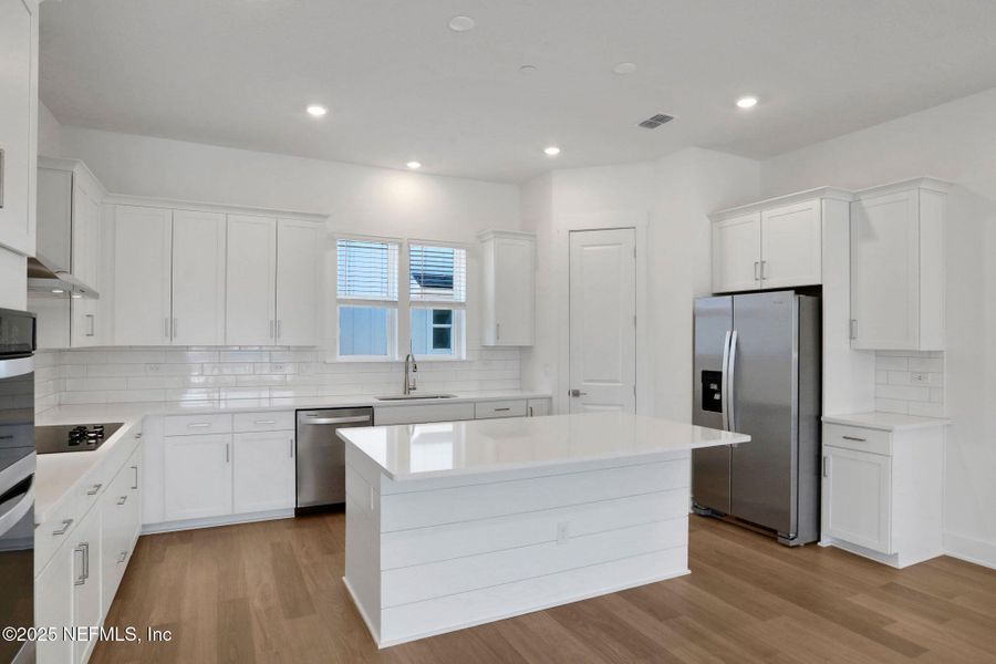 Furnished interior view inside a new home in North Beach Townhomes, Jacksonville Beach (Image 4).
