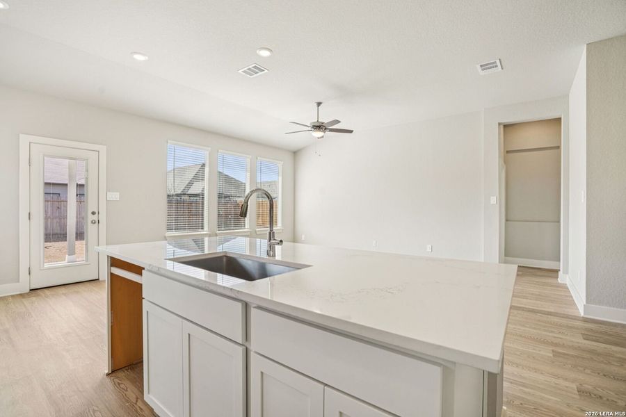Furnished interior view inside a new home in Estancia Ranch - Classic Series, San Antonio (Image 6).
