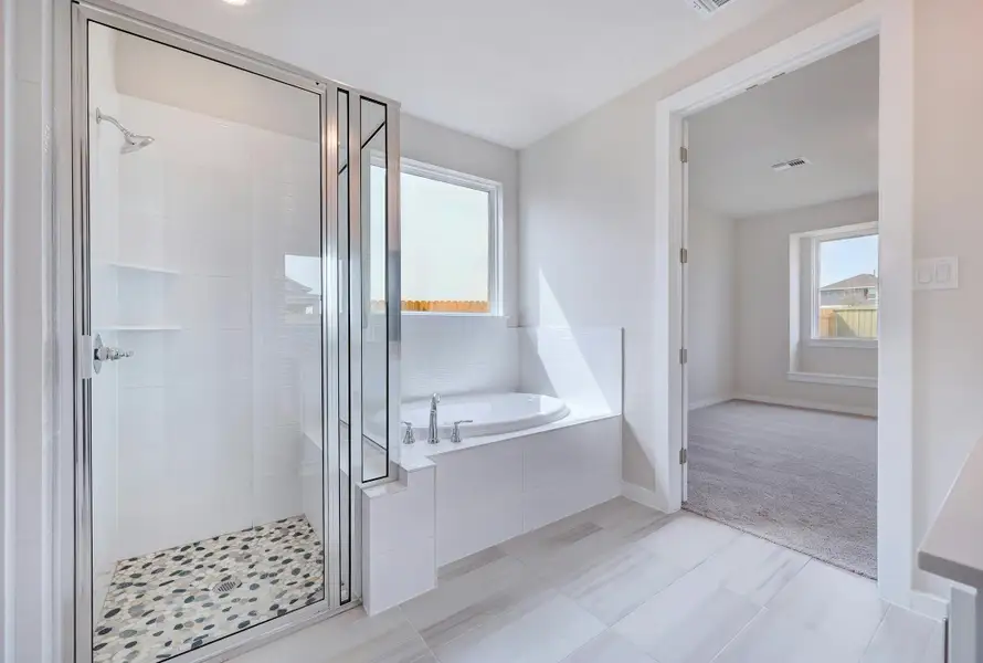 Representative furnished interior of a home built from the Travis by Scott Felder Homes in Flora, Hutto (Image 6).