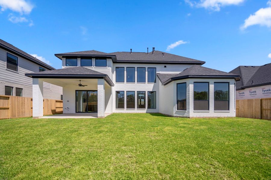 Exterior details and patio area of a home in Sienna 70′ Lots, Missouri City (Image 35).