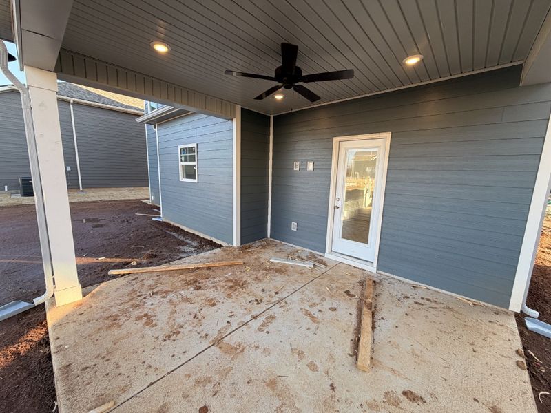 Covered Back Porch is included on this home!