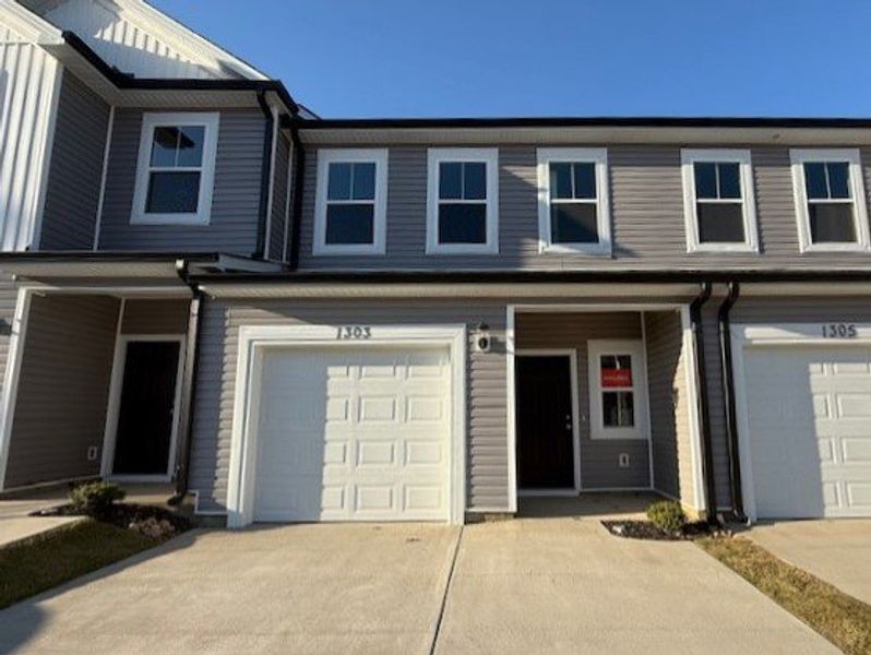 Front exterior of a new home in Caroleton Townhomes, Grovetown, GA, highlighting curb appeal (Image 20).