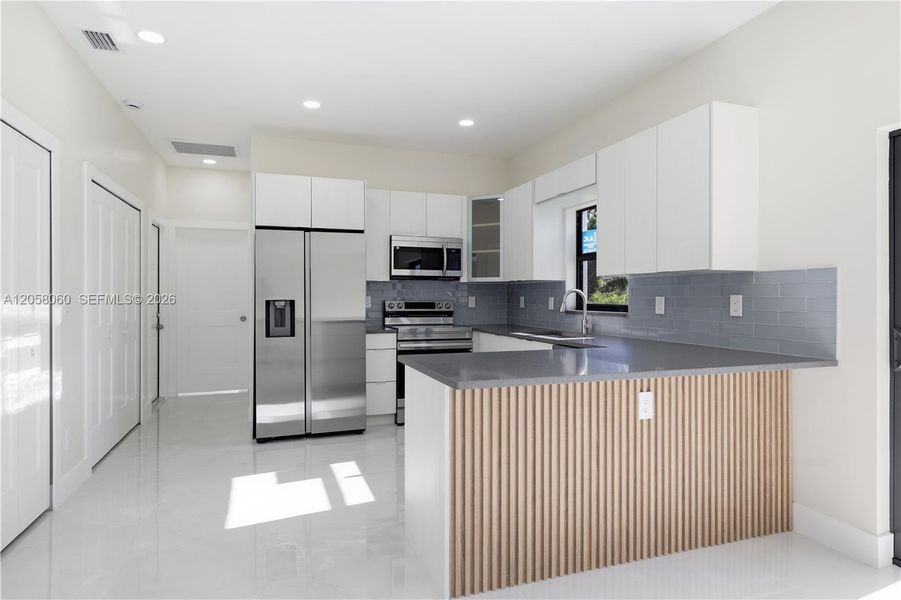 Furnished interior view inside a new home in , Lehigh Acres (Image 8).