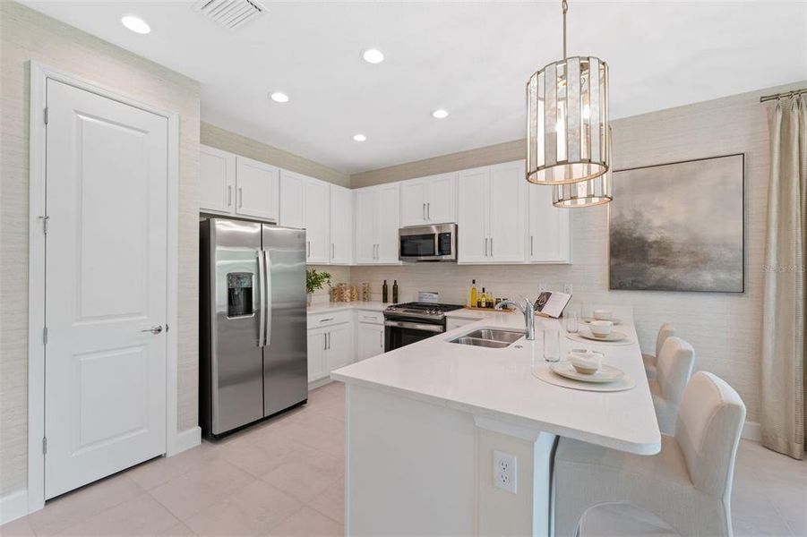 Furnished interior view inside a new home in Valencia Ridge, Wesley Chapel (Image 5).