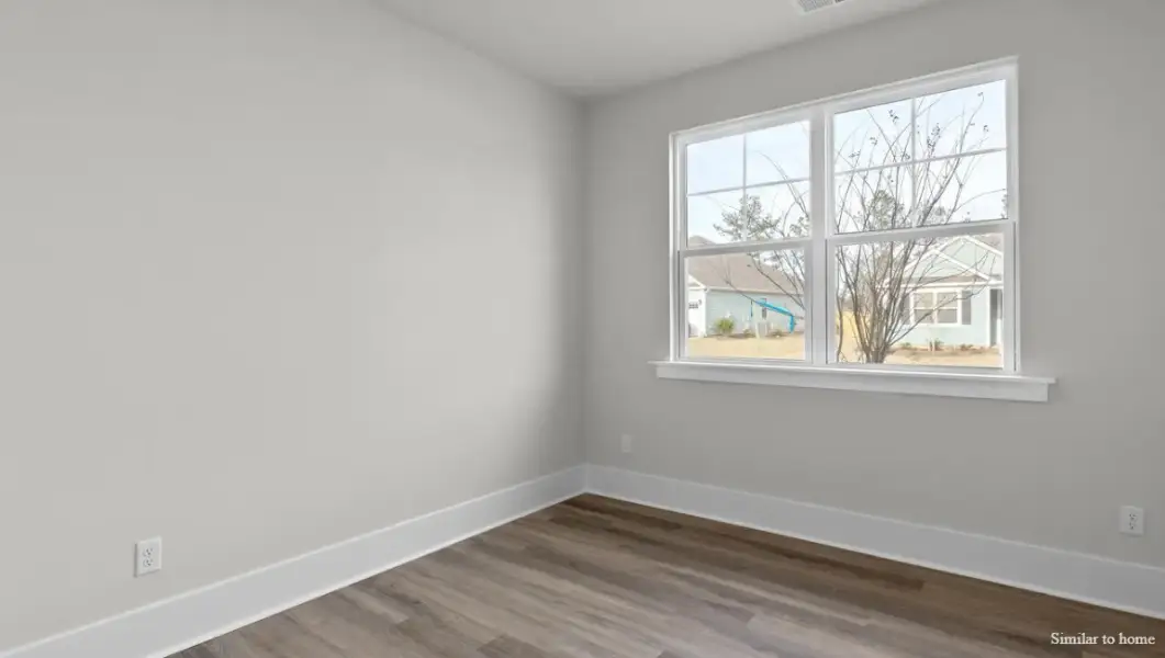 Spacious, unfurnished interior of a new home in The Highlands at Cedar Hill Landing, Navassa (Image 29).