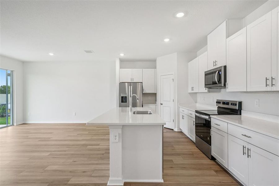 Furnished interior view inside a new home in Two Rivers - Classic Series, Zephyrhills (Image 10).