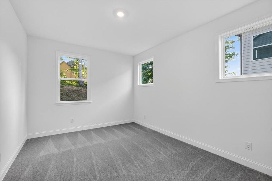 Spacious, unfurnished interior of a new home in Bailey Fence, Dacula (Image 23).