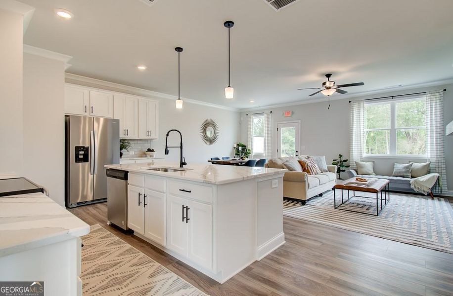 Furnished interior view inside a new home in The Towns at Auburn Station West, Auburn (Image 2).