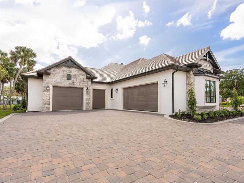 Front exterior of a new home in , Sarasota, FL, highlighting curb appeal (Image 27).