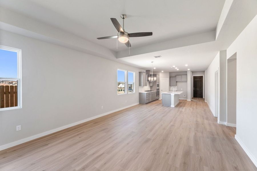 Spacious, unfurnished interior of a new home in Hunters Ranch, San Antonio (Image 26).