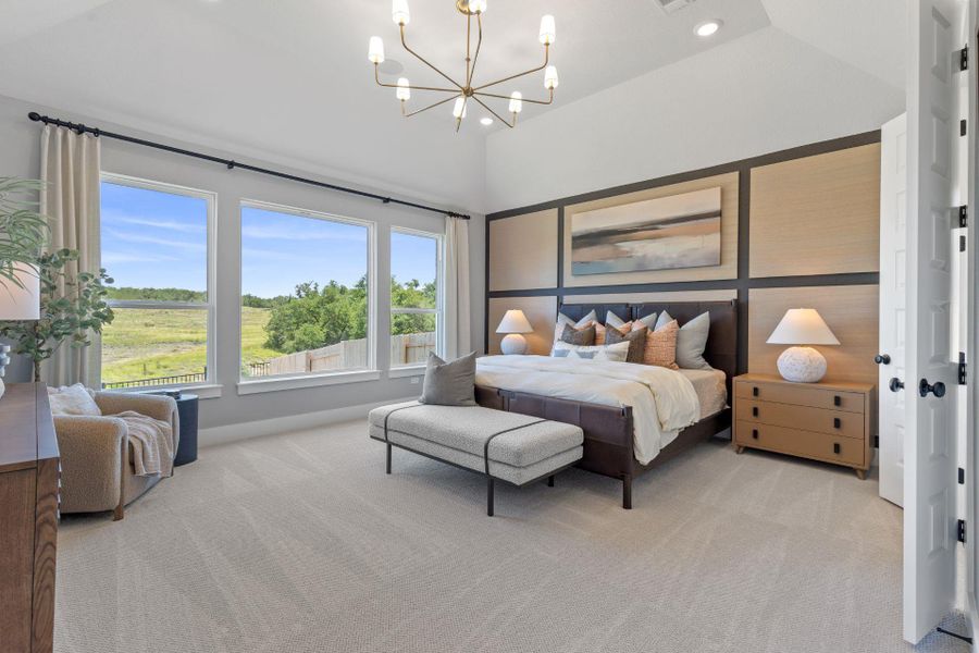 Primary Bedroom with elevated ceiling - Representative Photo