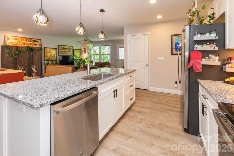 Kitchen with stainless steel appliances. Kitchen with stainless steel appliances.
