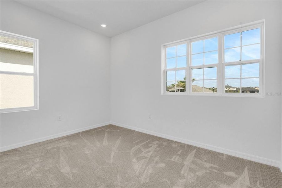 Spacious, unfurnished interior of a new home in Turnleaf, Punta Gorda (Image 28).