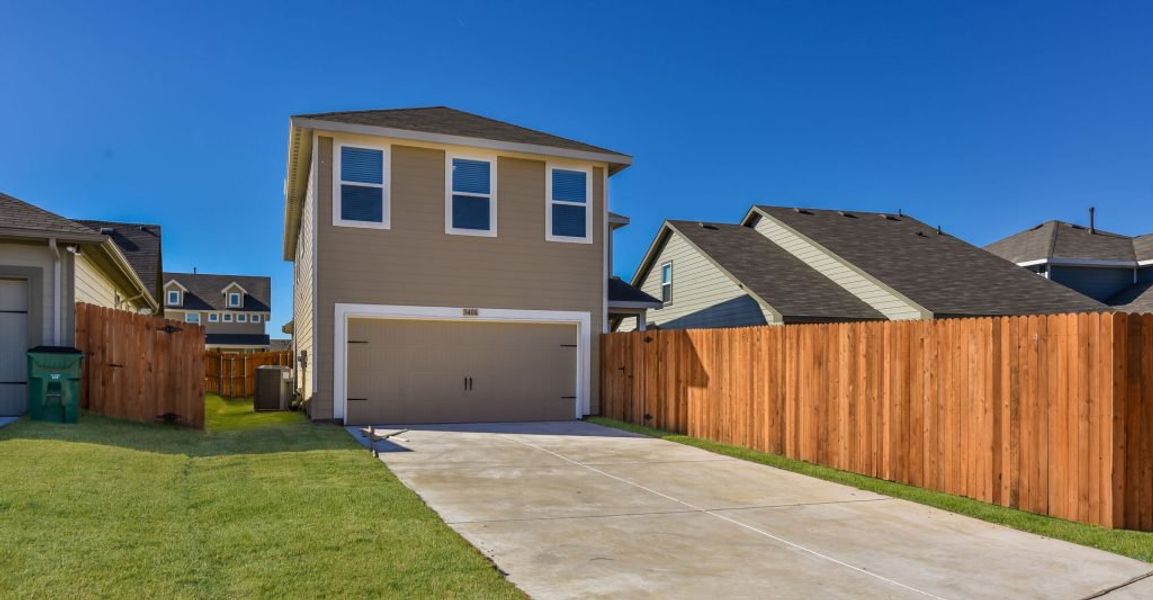 Representative exterior photo of a completed home built from the Adina by Impression Homes in Heartland, Heartland, TX (Image 27). Representative exterior photo of a completed home built from the Adina by Impression Homes in Heartland, Heartland, TX (Image 27).