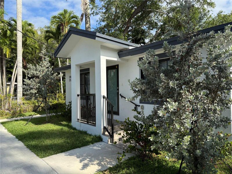 Front exterior of a new home in , Florida City, FL, highlighting curb appeal (Image 10).