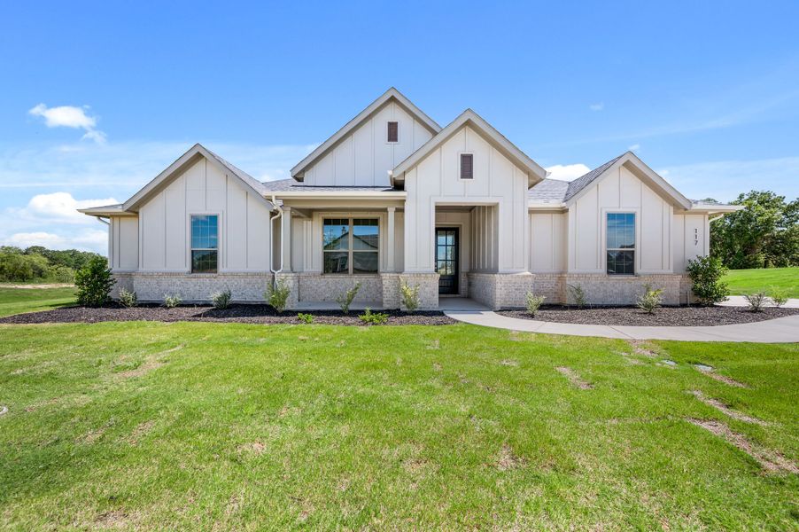 Representative exterior photo of a completed home built from the Sophia by Our Country Homes in Rocky Top Ranch, Reno, TX (Image 7). Representative exterior photo of a completed home built from the Sophia by Our Country Homes in Rocky Top Ranch, Reno, TX (Image 7).