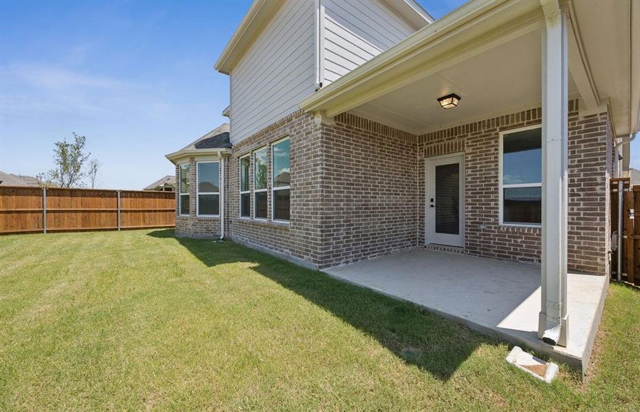 Oversized yard with covered patio *Real home pictured Oversized yard with covered patio *Real home pictured