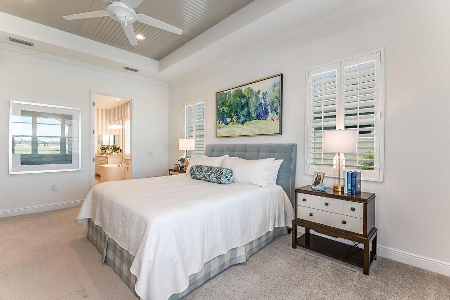 Representative furnished interior of a home built from the Kiawah 2 by Neal Communities in SkySail, Naples (Image 11).