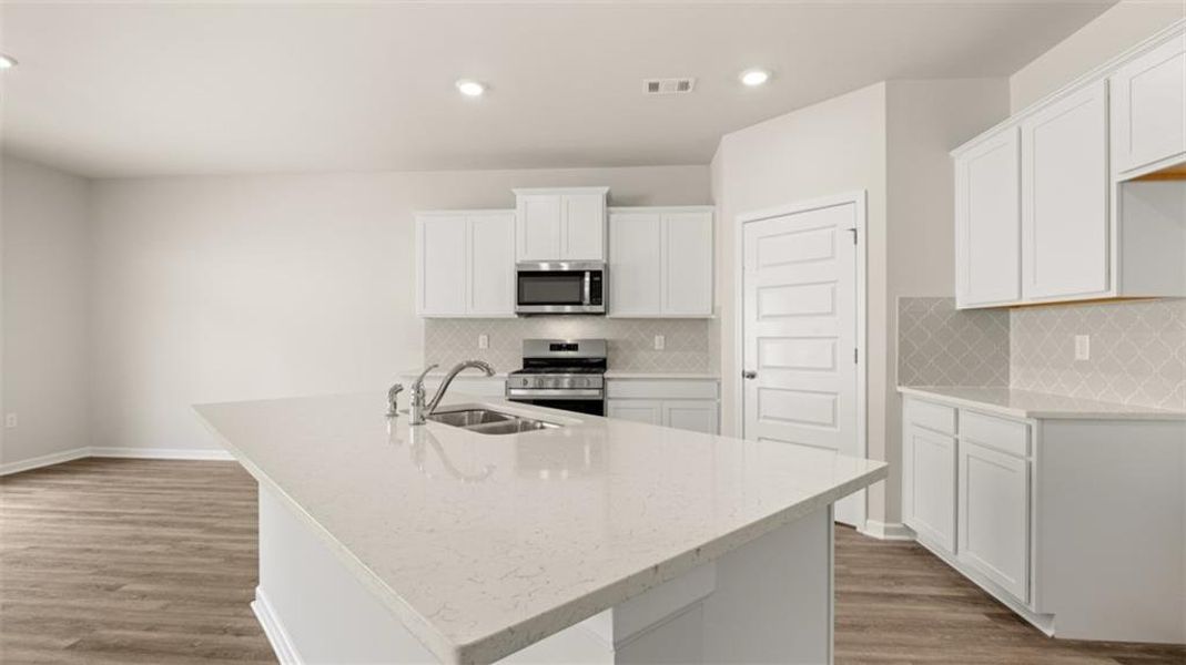 Furnished interior view inside a new home in Brooks Station, Dacula (Image 6). Furnished interior view inside a new home in Brooks Station, Dacula (Image 6).