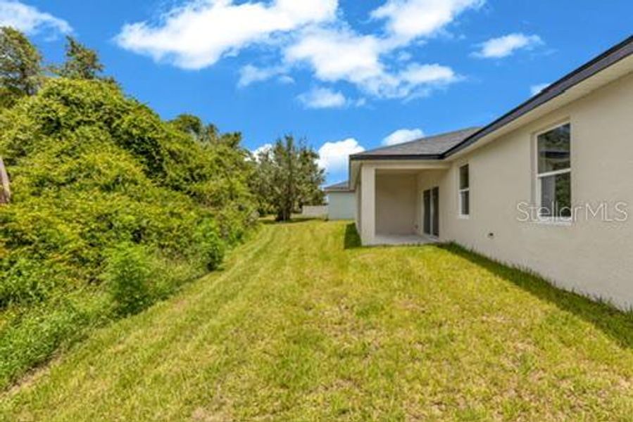 Exterior details and patio area of a home in , Deltona (Image 16).