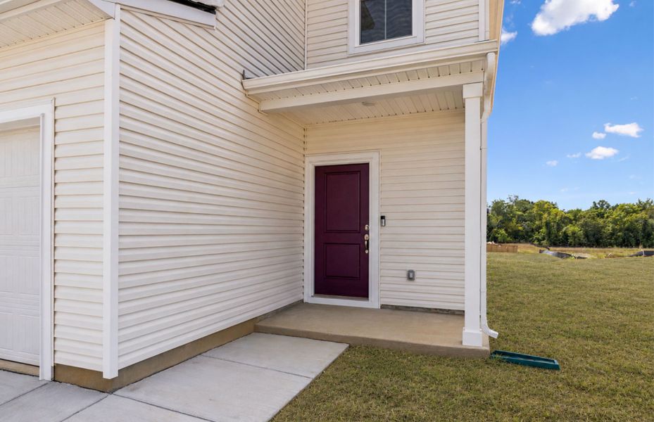 Exterior details and patio area of a home in Highlands of Carter's Station, Columbia (Image 23).