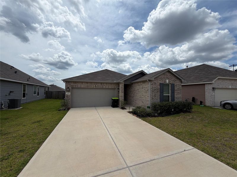 Front exterior of a new home in , Magnolia, TX, highlighting curb appeal (Image 17). Front exterior of a new home in , Magnolia, TX, highlighting curb appeal (Image 17).