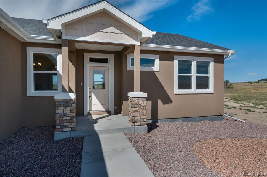 Exterior details and patio area of a home in , Pueblo West (Image 3).