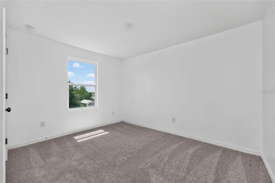 Spacious, unfurnished interior of a new home in , Port Charlotte (Image 51).