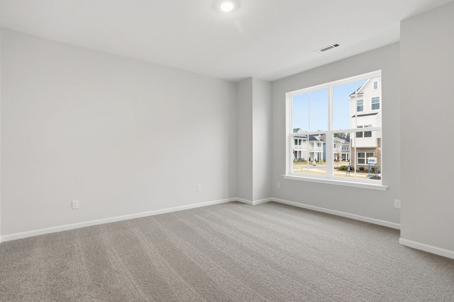 Spacious, unfurnished interior of a new home in Renaissance at White Oak, Garner (Image 30).