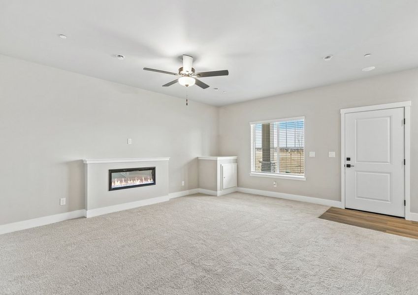 The first floor has a family room with a fireplace.