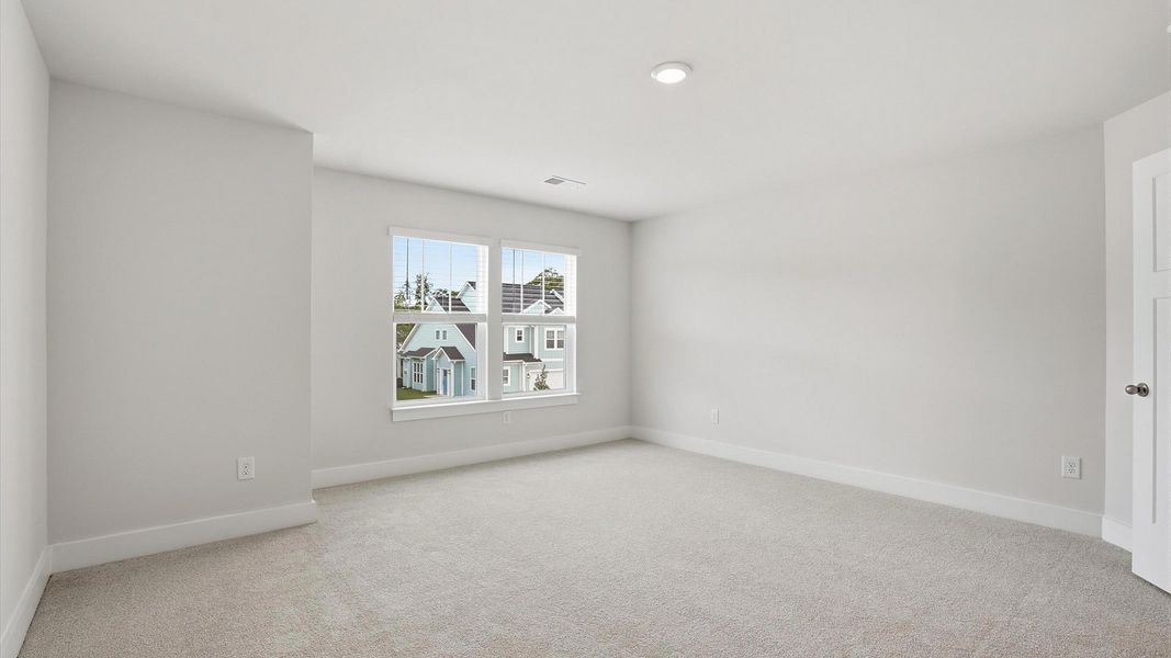 Furnished interior view inside a new home in Village at Midway, Anderson (Image 24).