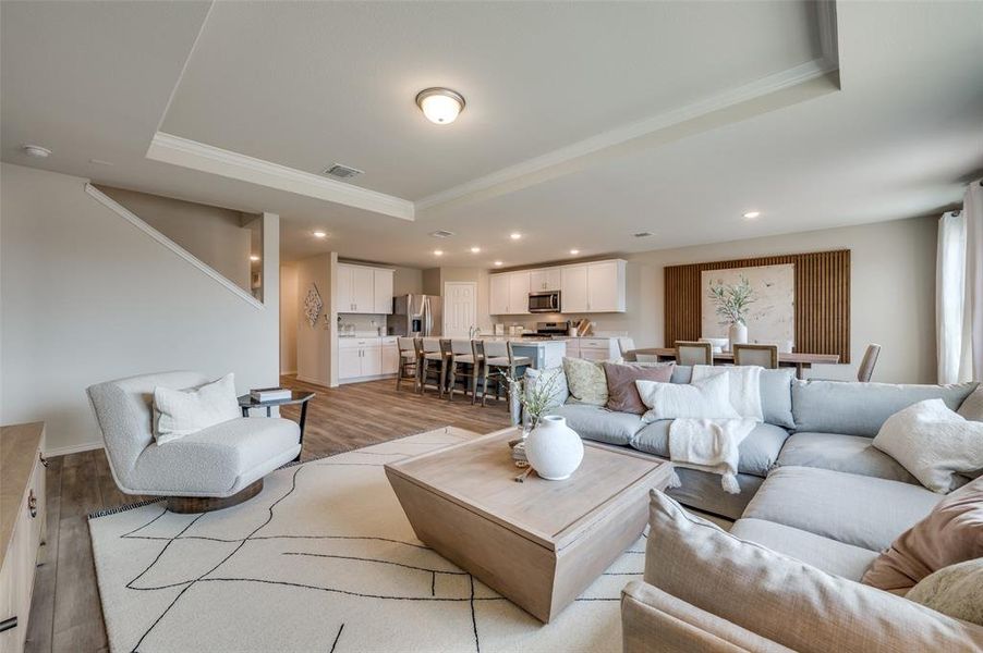 Spacious gathering room with large windows *Model Representation*